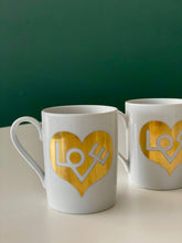Load image into Gallery viewer, Alexander Girard / Gold Love Mug / Gold Sun Mug