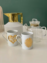 Load image into Gallery viewer, Alexander Girard / Gold Love Mug / Gold Sun Mug

